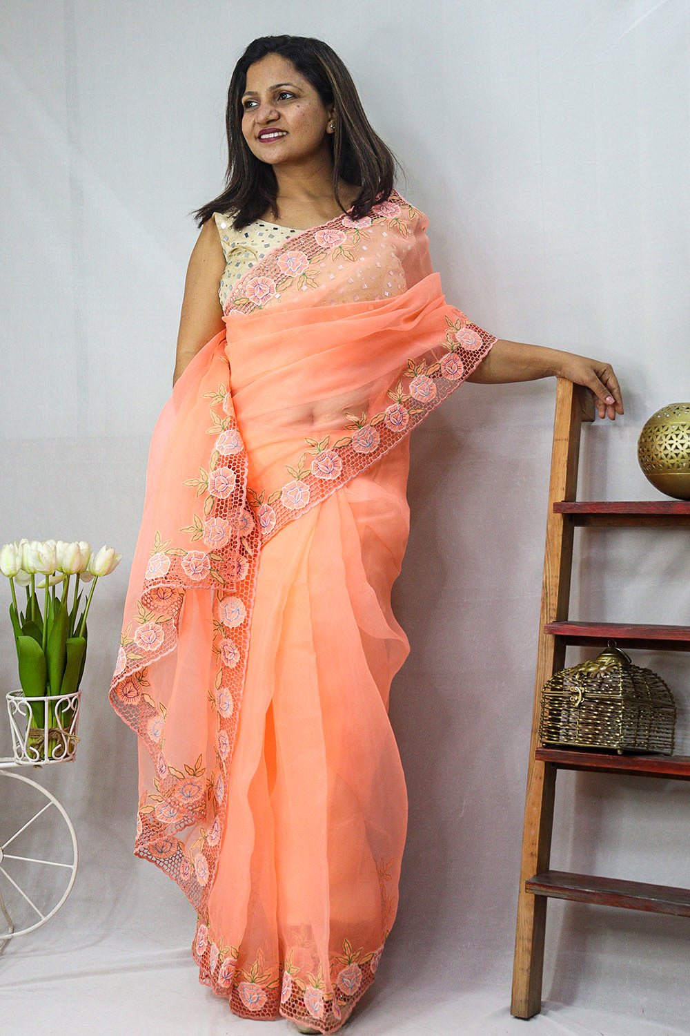 https://www.luxurionworld.com/cdn/shop/files/IS1T222021904_Orange_Trendy_Organza_Cut_Work_Saree_1_7024c605-b6d7-4444-a332-70418c2b77cf.jpg?v=1689595548