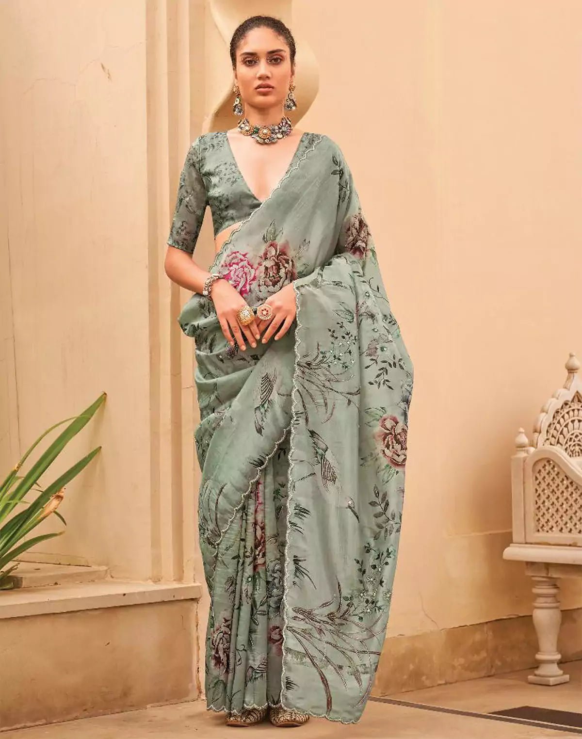 https://www.southindiaeshop.com/cdn/shop/files/light-green-all-over-floral-printed-party-wear-organza-saree-827755.webp?v=1751013607